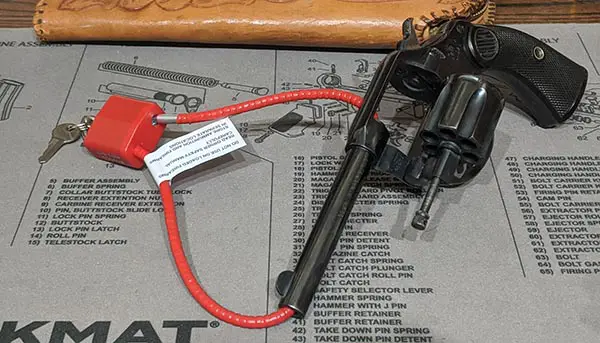 using a cable lock with a revolver