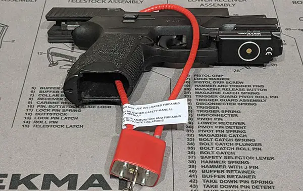 method 1: run pistol cable lock through the magazine well