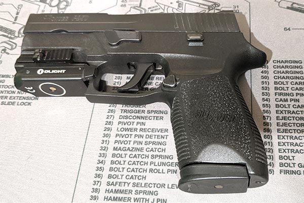 9mm handgun model with flashlight