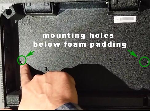 pre-drilled holes below foam padding for mounting bedside safe