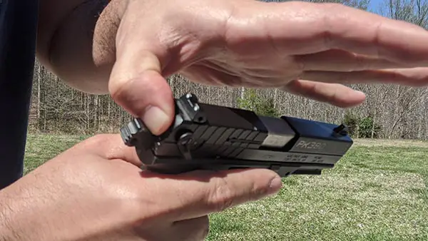 manually decock pistol - thumb between hammer and firing pin