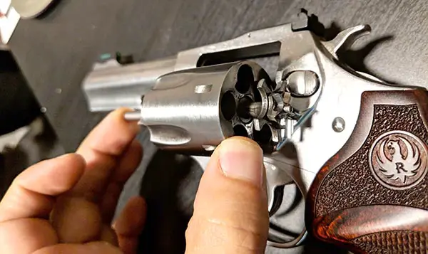 inspect action on a new revolver including ejector rod