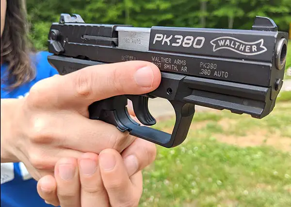 pk380 in small hands of female shooter