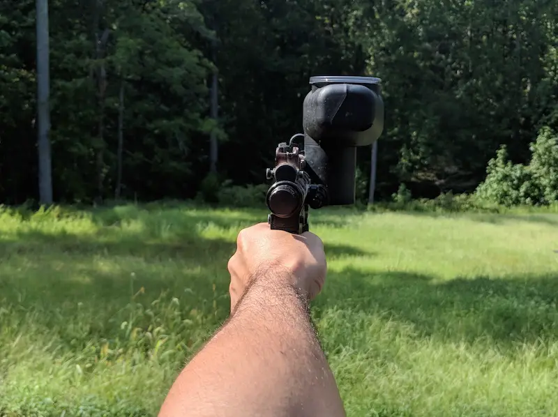 first person perspective aiming paintball gun