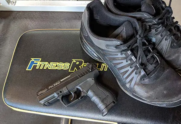 best ways to concealed carry while working out - gym shoes and pistol