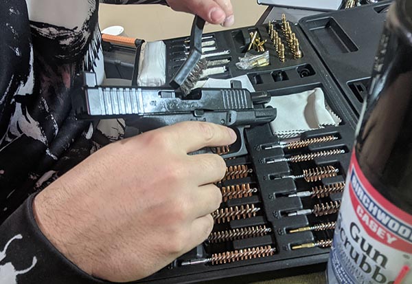attempting to clean a gun without taking it apart