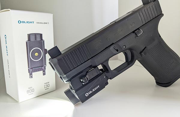 OLIGHT BALDR S flashlight review: gun, light, and box