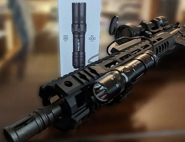 olight odin gl review: flashlight and laser on AR rifle