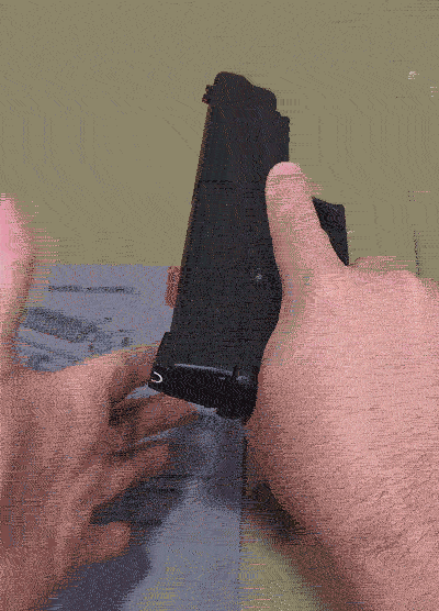 how to thumb rack the slide on a handgun
