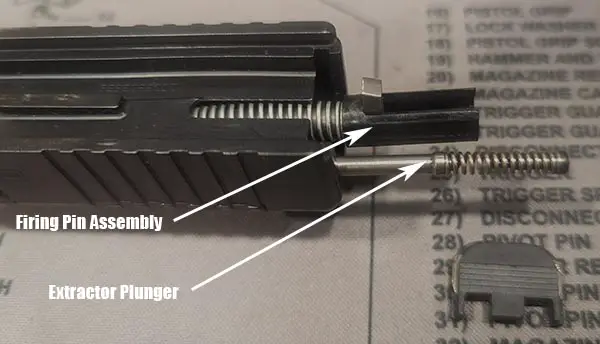 firing pin assembly and extractor plunger detail